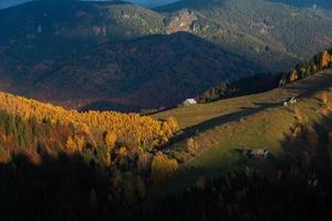 A charming mountain landscape in the Bucegi mountains, Carpathians, Romania. Autumn nature in Moeciu de Sus, Transylvania photo