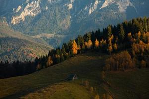 A charming mountain landscape in the Bucegi mountains, Carpathians, Romania. Autumn nature in Moeciu de Sus, Transylvania photo