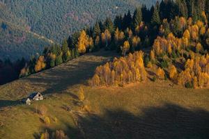 A charming mountain landscape in the Bucegi mountains, Carpathians, Romania. Autumn nature in Moeciu de Sus, Transylvania photo