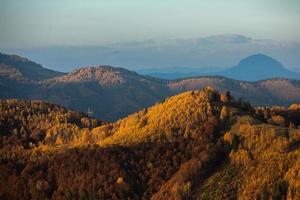 A charming mountain landscape in the Bucegi mountains, Carpathians, Romania. Autumn nature in Moeciu de Sus, Transylvania photo