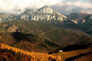 A charming mountain landscape in the Bucegi mountains, Carpathians, Romania. Autumn nature in Moeciu de Sus, Transylvania photo