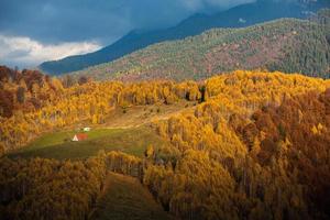 A charming mountain landscape in the Bucegi mountains, Carpathians, Romania. Autumn nature in Moeciu de Sus, Transylvania photo