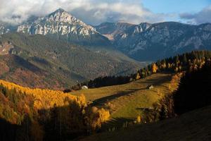 A charming mountain landscape in the Bucegi mountains, Carpathians, Romania. Autumn nature in Moeciu de Sus, Transylvania photo