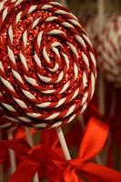 Whimsical Red and White Lollipop Holiday Ornament photo