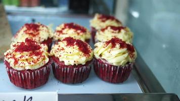 Half a dozen of cupcakes on display video