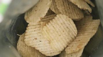 View inside a bag of ridge potato chips video