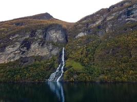 With a cruise ship in the fjords of norway photo