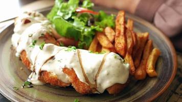 Delicious fried shrimp with sauce and fries video