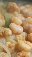 Close up of shrimp simmering in butter video