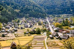 Shirakawa Historical Japanese. Shirakawago village in autumn from aerial view. House build by wooden with roof gassho zukuri style. Shirakawa-go is Unesco world heritage and landmark spot in Japan photo