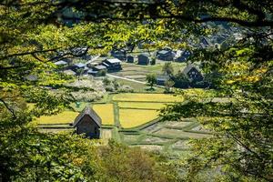 Shirakawa Historical Japanese. Shirakawago village in autumn from aerial view. House build by wooden with roof gassho zukuri style. Shirakawa-go is Unesco world heritage and landmark spot in Japan photo