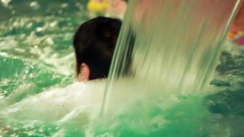 woman in a small indoor pool in the sauna video