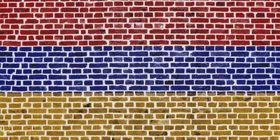 Flag of Armenia painted on a brick wall photo