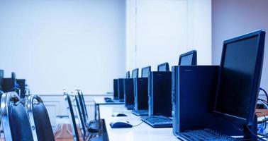 Computer and monitor row in computer class photo