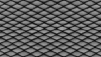 Black color mesh pattern seamless background. Blur focus photo