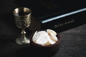 Concept of Eucharist or holy communion of Christianity. Eucharist is sacrament instituted by Jesus. during last supper with disciples. Bread and wine is body and blood of Jesus Christ of Christians. photo