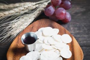 Concept of Eucharist or holy communion of Christianity. Eucharist is sacrament instituted by Jesus. during last supper with disciples. Bread and wine is body and blood of Jesus Christ of Christians. photo