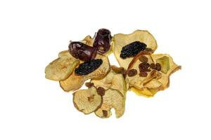 pile of mixed dried fruit prunes, apples, raisins and dates,isolated on white background photo