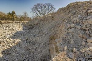 mound of construction site. mountain of sand and clay photo