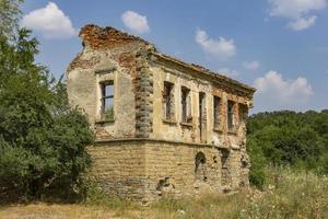 daily view of an old abandoned house without a roof photo