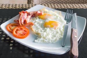 Breakfast with egg and bacon photo