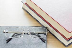 Glasses put on notebook photo