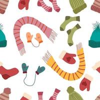 Seamless pattern of winter clothes.Socks scarves mittens and valenki on a white background.Flat vector illustration.