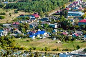 panoramic aerial view of private development with country houses or village photo