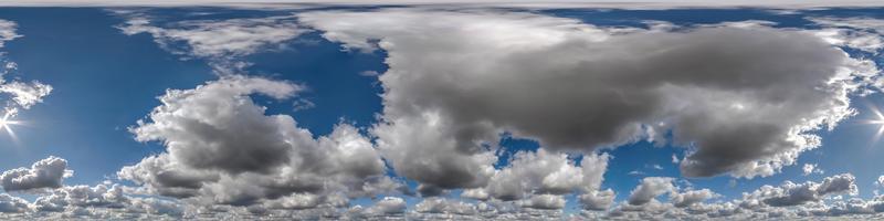 blue sky with beautiful clouds as seamless hdri 360 panorama view with zenith for use in 3d graphics or game development as sky dome or edit drone shot photo