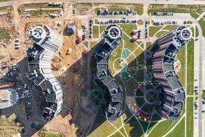 aerial panoramic view from height of a multi-storey residential complex and urban development in autumn day photo