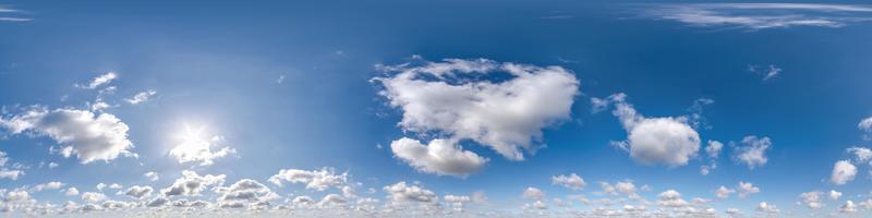 blue sky with beautiful clouds as seamless hdri 360 panorama view with zenith for use in 3d graphics or game development as sky dome or edit drone shot photo