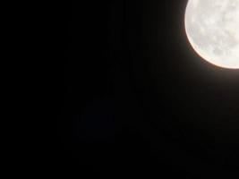 Night moon close-up on the sky photo