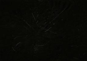 Folded paper with grungy texture in black background. can be used to replicate the aged and worn look for your creative design. old paper for photo texture overlay in retro style