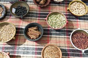 Various seeds in bowl on wooden table. Healthy and nutrition food concept