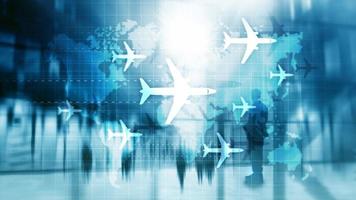 Air travel concept. Airplane on world map Blured Business background photo