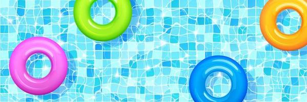 Swimming pool with colorful inflatable rings. vector