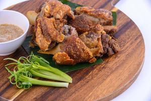 Deep fried Pork Knuckle on white background. photo