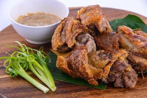 Deep fried Pork Knuckle on white background. photo