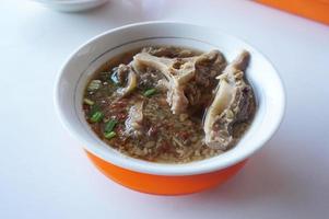 sop buntut or Oxtail Soup one of popular soups in Indonesia, selective focus photo