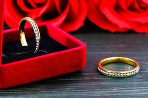 Diamond  wedding ring in red jewel box photo