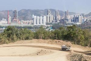 Cement factory  in the mountains photo