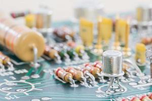 Condensers and Resistor assembly on the circuit board photo