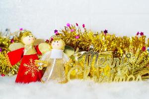 Chrismas doll with Christmas ornaments and decorations photo