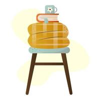 a stool with a plaid blanket, a book and a cup of tea. cozy autumn illustration vector