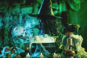 Young Witch Is Cooking Skull Potion photo
