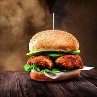Chicken burger. Fresh tasty burger with fried chicken meat. photo