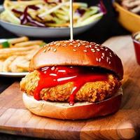 Chicken burger. Fresh tasty burger with fried chicken meat. photo