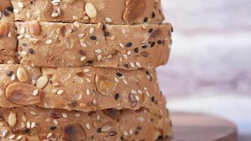 Close up shot of bread slices, covered with sesame and nuts video