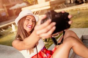 Beautiful Girl Taking A Selfie photo