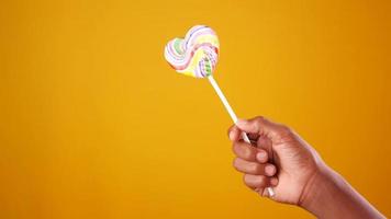 A heart shaped lollipop, hard candy video